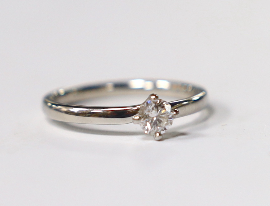 A platinum and solitaire diamond set ring, size O, gross weight 3.5 grams